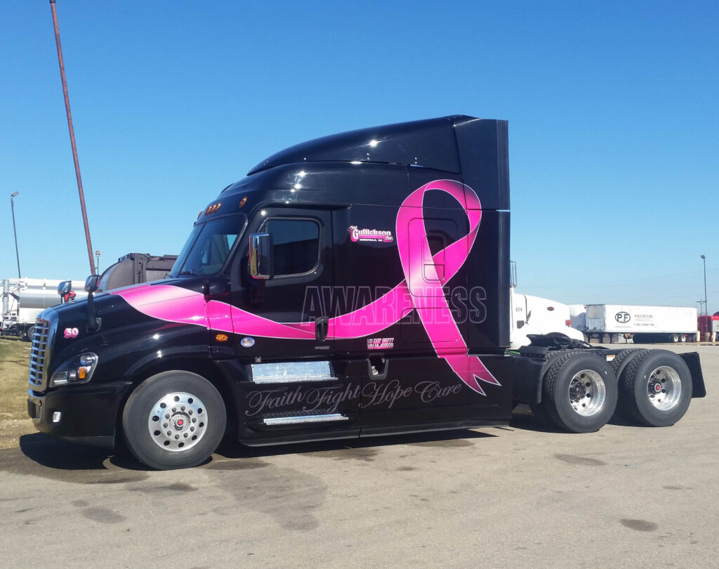 truck with large breast cancer awareness ribbon and text reading faith, fight, hope, cure