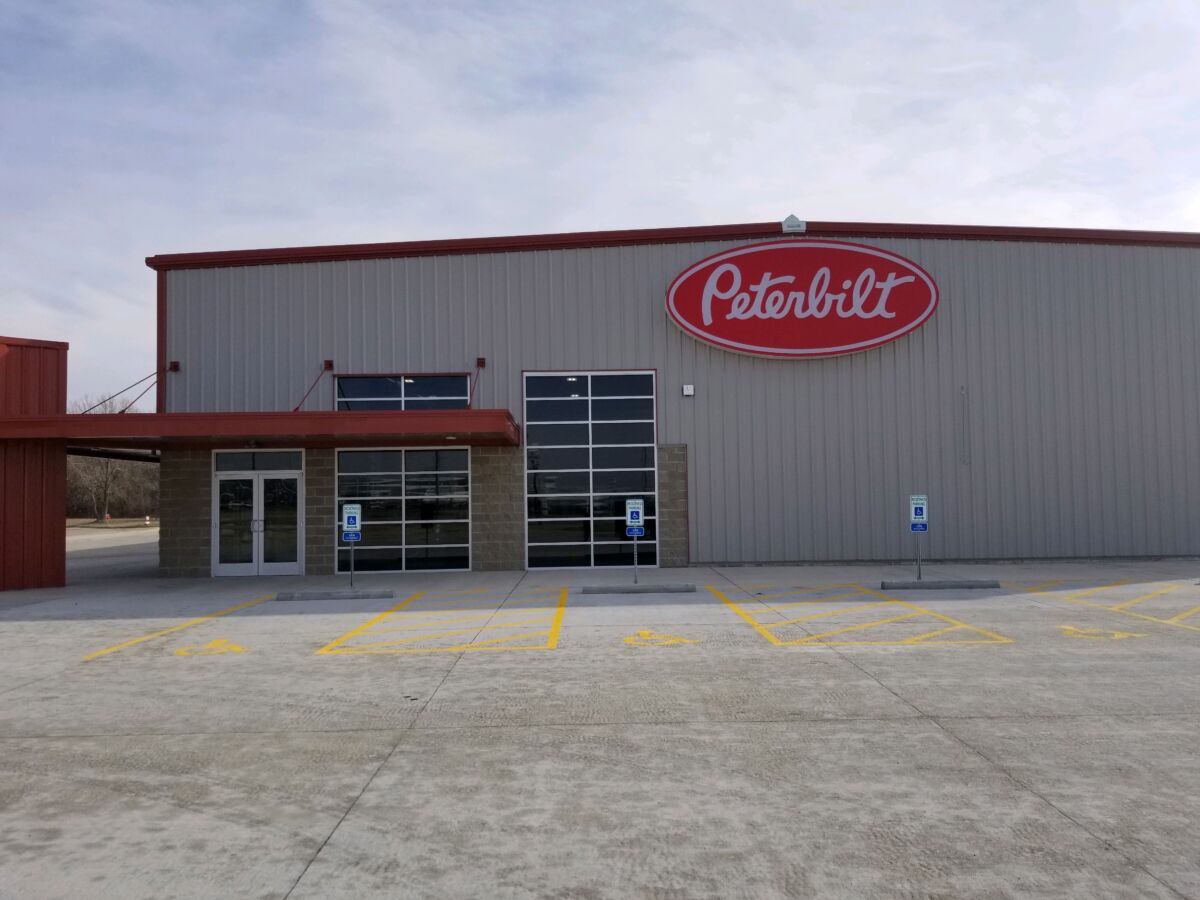 JX Truck Center Champaign new building. Shot of the front entrance with the Peterbilt logo