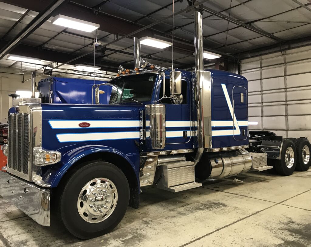 blue and white striped peterbilt