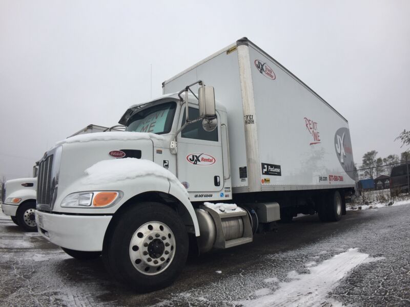 White Peterbilt box truck parked and ready to rent. Prepare fleet for winter weather
