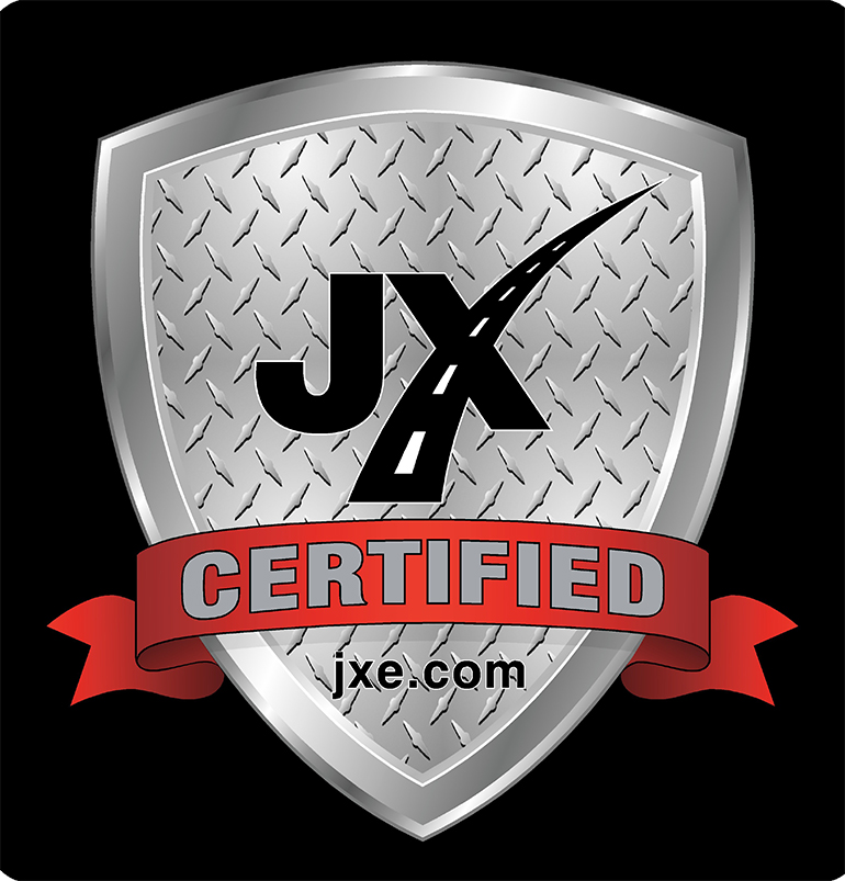 diamond plate shield wit JX logo over it