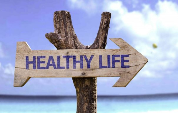 Arrow shaped sign pointing to Healthy Life
